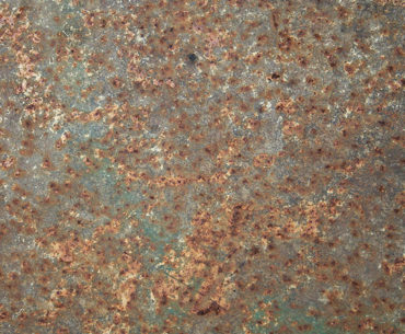 Rusty metal texture with some green